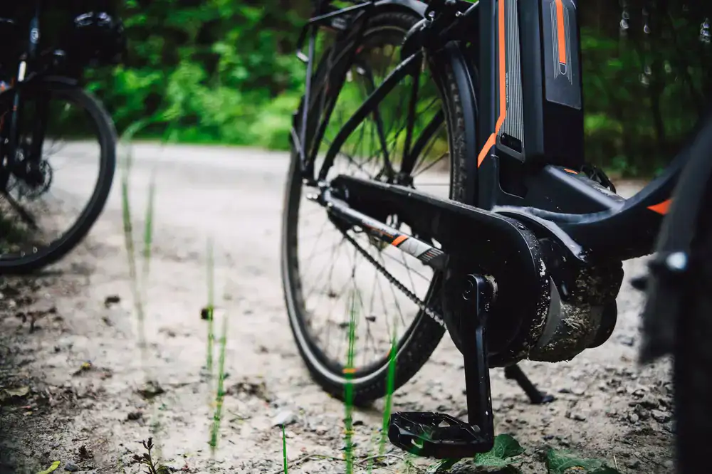 Robust electric mountain bike on a dirt path