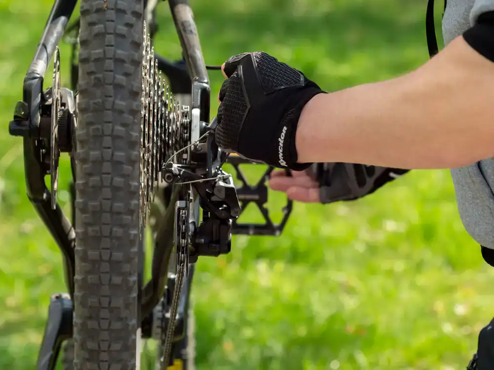 Mechanic adjusting components on an electric bicycle